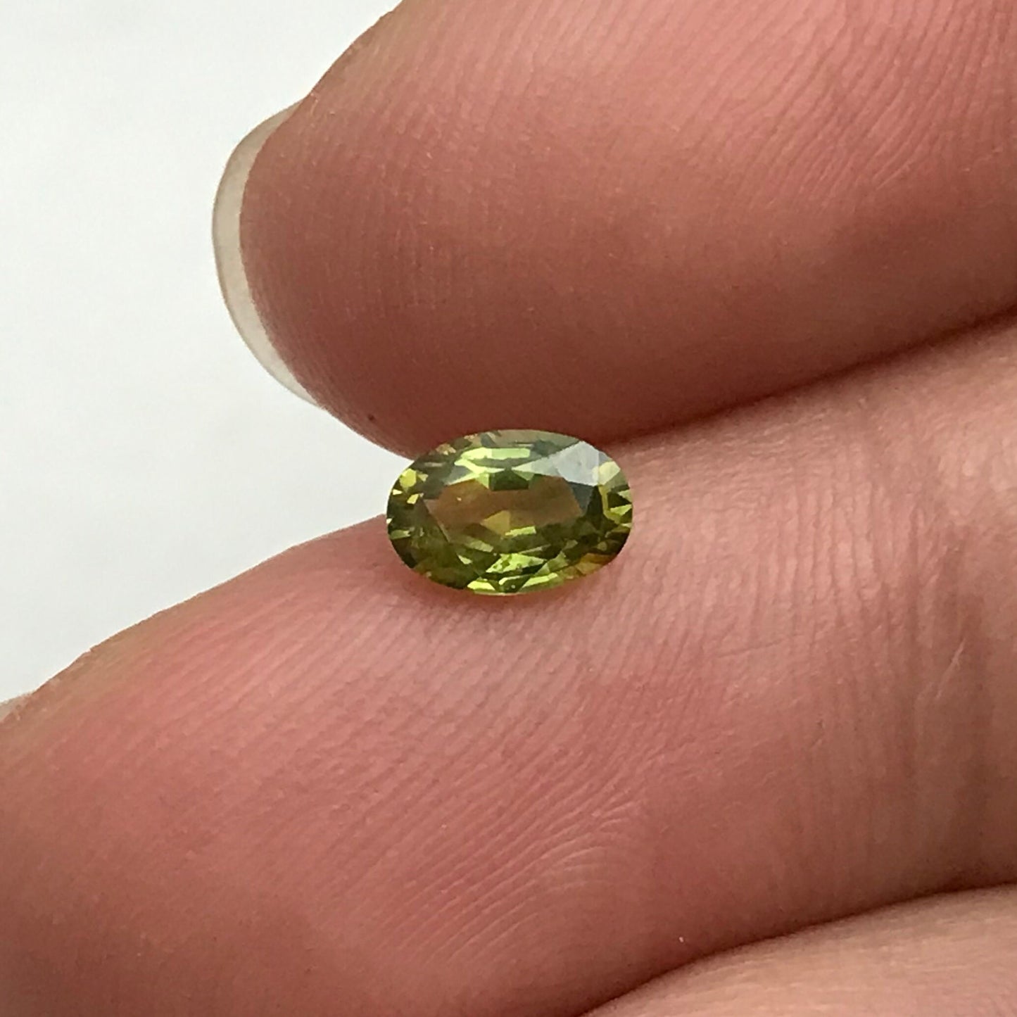Greenish Yellow Sapphire 6x4mm, Color-Treated Yellow Green 0.53 Ct, Oval cut, BE Treated Natural Sapphire