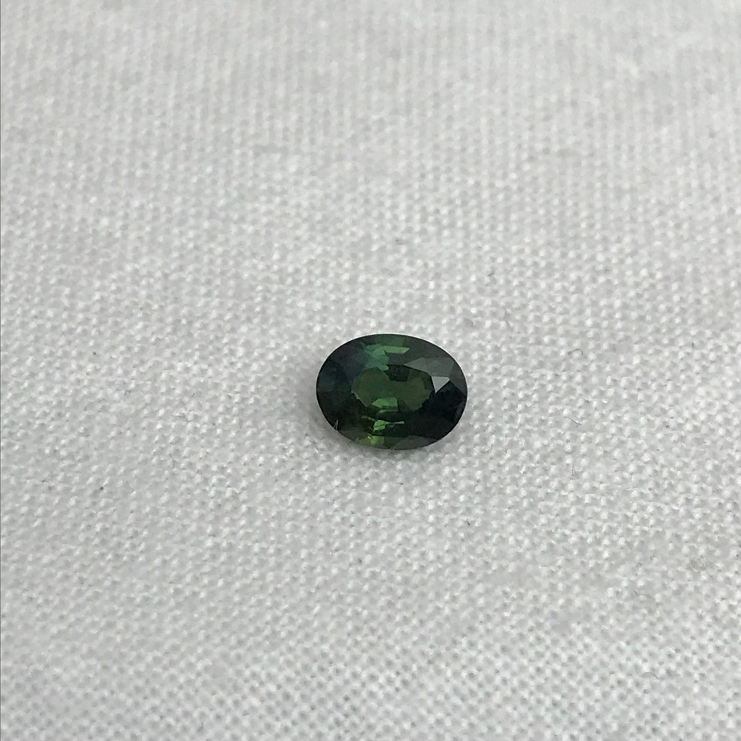 0.67 carat Natural Green Sapphire Oval Approx. 5x4.5mm