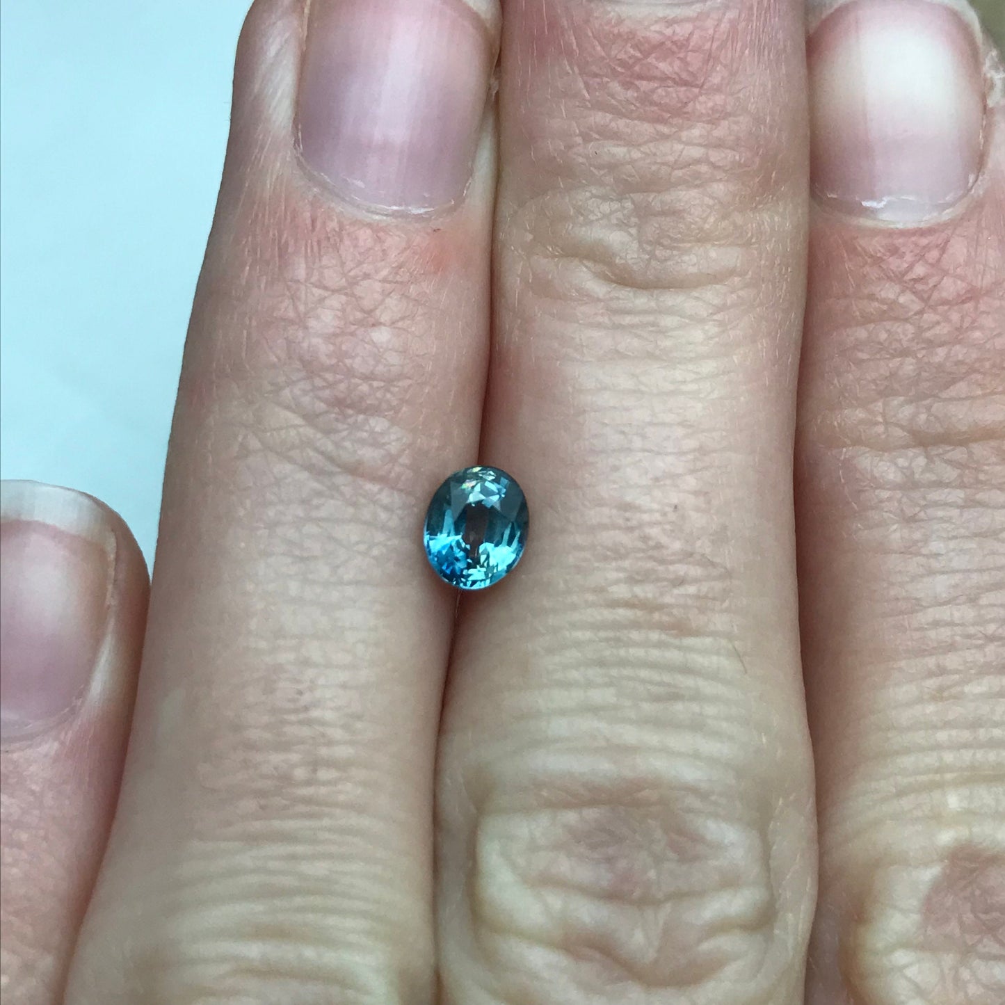 0.76 Carat Light Blue Sapphire 5.6x4.7mm Oval Cut, Heat Treated, Faceted Loose Natural Sapphire