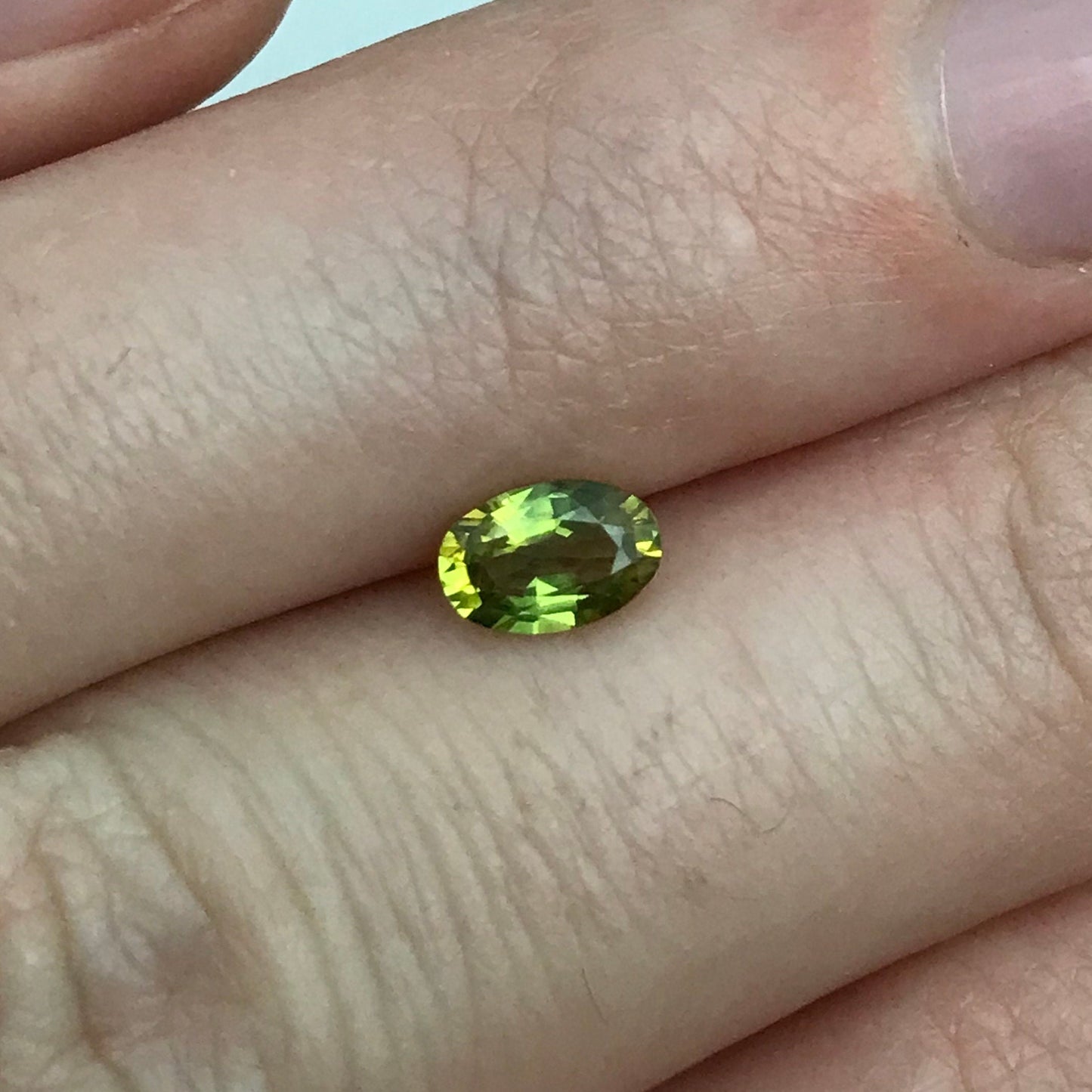 Greenish Yellow Sapphire 6x4mm, Color-Treated Yellow Green 0.53 Ct, Oval cut, BE Treated Natural Sapphire