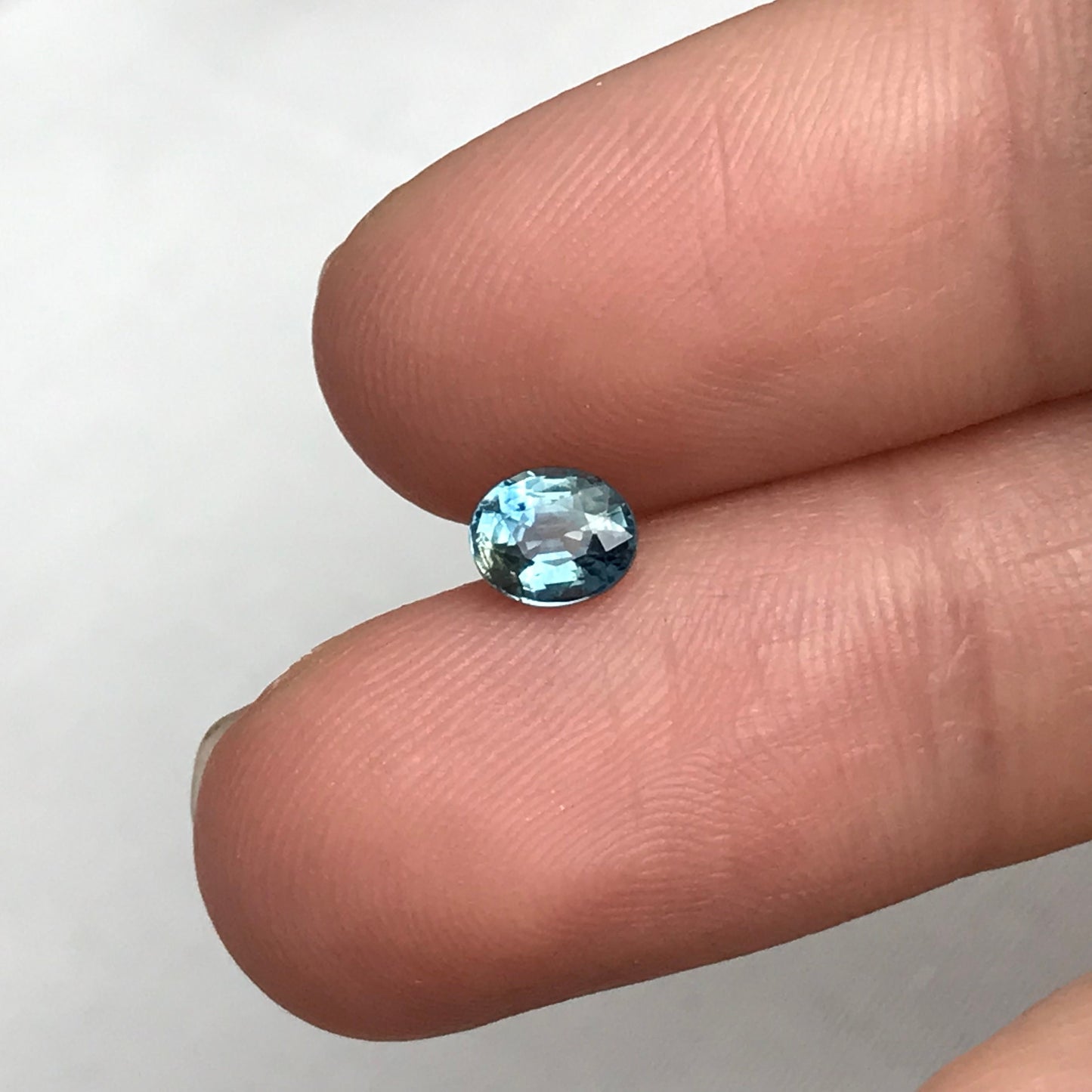 0.76 Carat Light Blue Sapphire 5.6x4.7mm Oval Cut, Heat Treated, Faceted Loose Natural Sapphire
