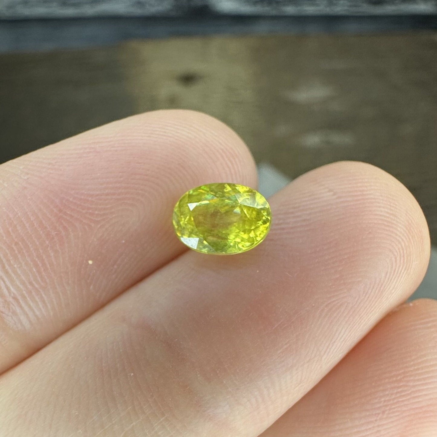 Yellow Sphene Oval Cut, 1.12 Carat Natural Light Yellow Sphene with Rainbow Flashes
