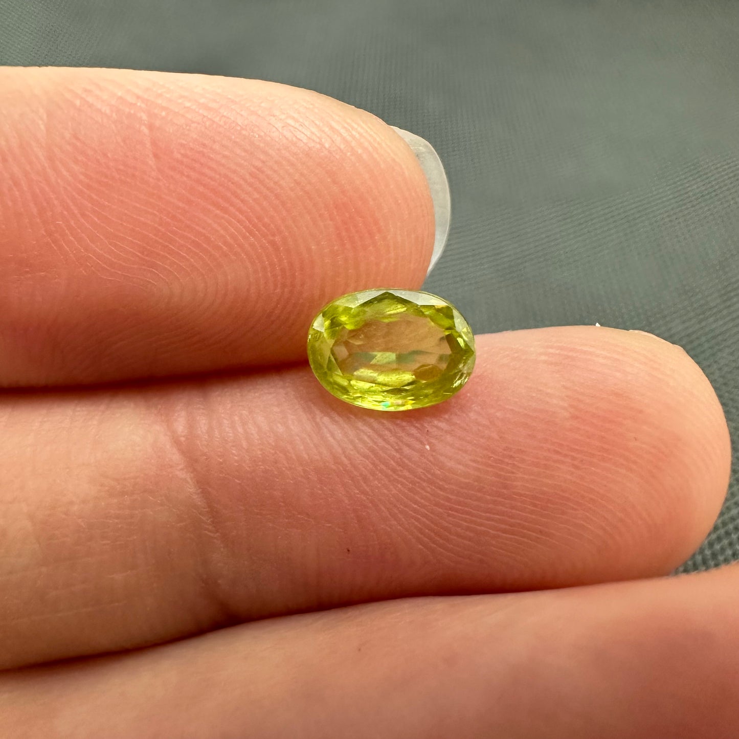 1.11 carat Yellowish Green Sphene 7.3x5.3mm Oval Cut, Natural Madagascar Sphene, Faceted Loose Vivid Green Titanite