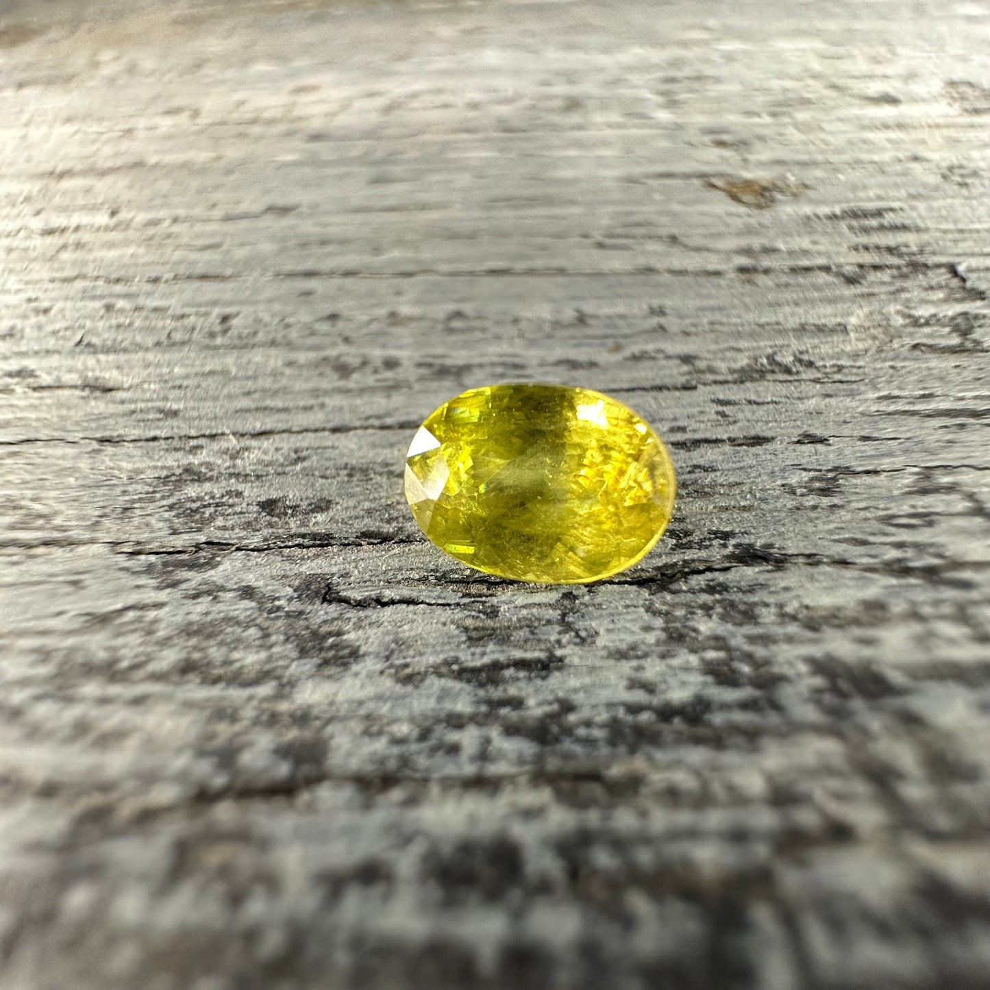 Yellow Sphene Oval Cut, 1.12 Carat Natural Light Yellow Sphene with Rainbow Flashes