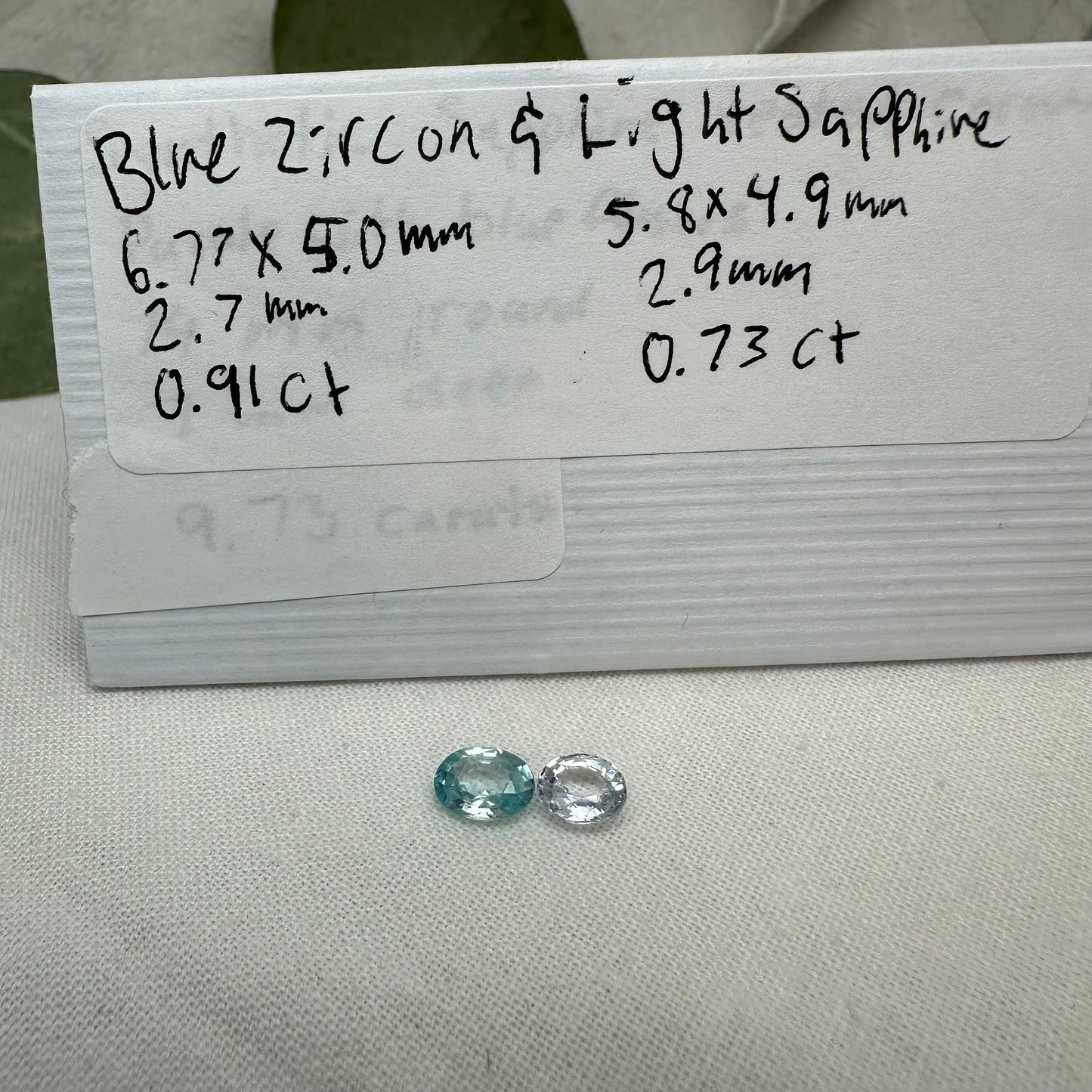 Natural Light Sapphire and Blue Zircon Parcel, 6.8x5mm Oval cut Zircon and 5.8x5mm Sapphire