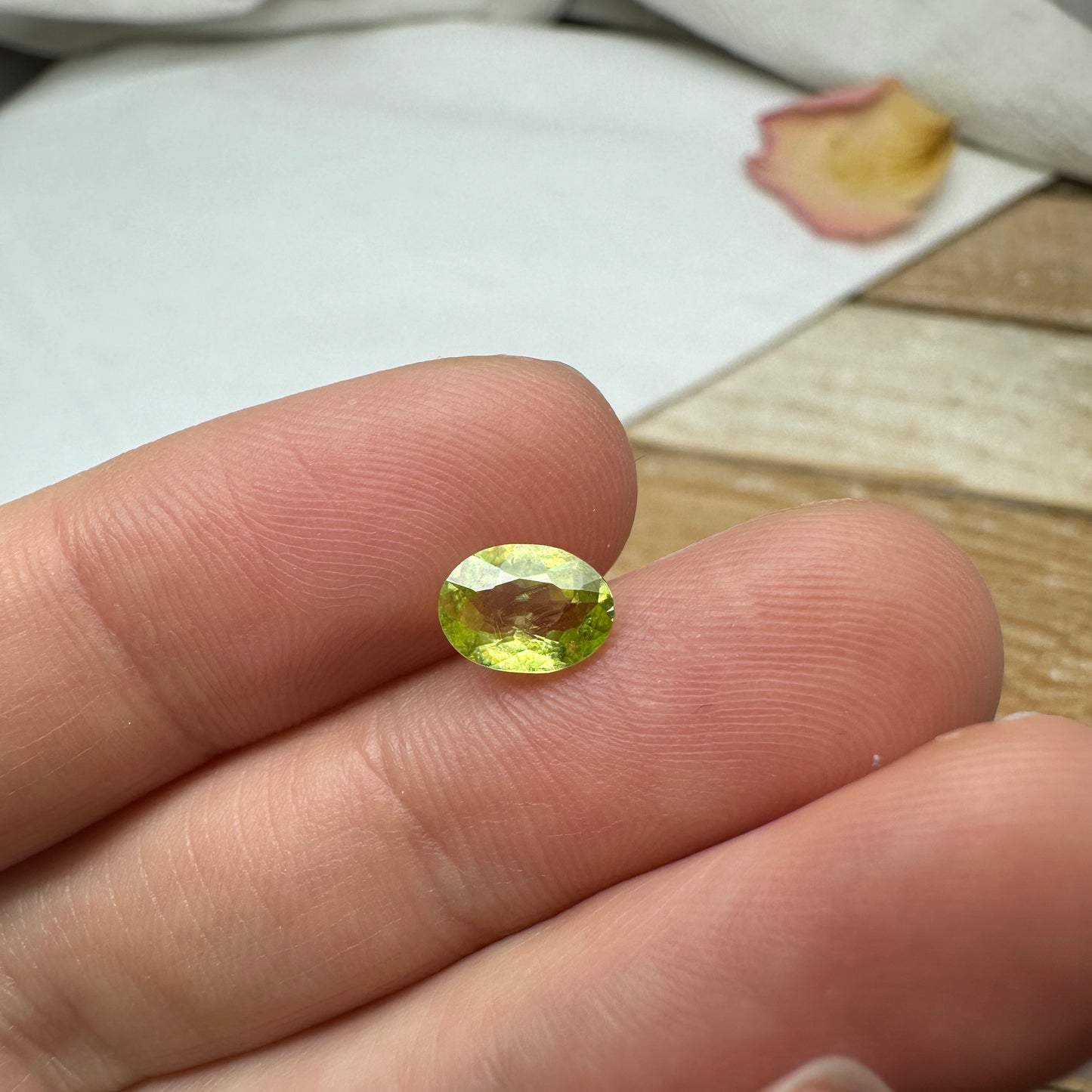 0.93 Yellow Green Sphene with Rainbow Flashes 7.3x5.3mm Oval Cut, Faceted Loose Titanite
