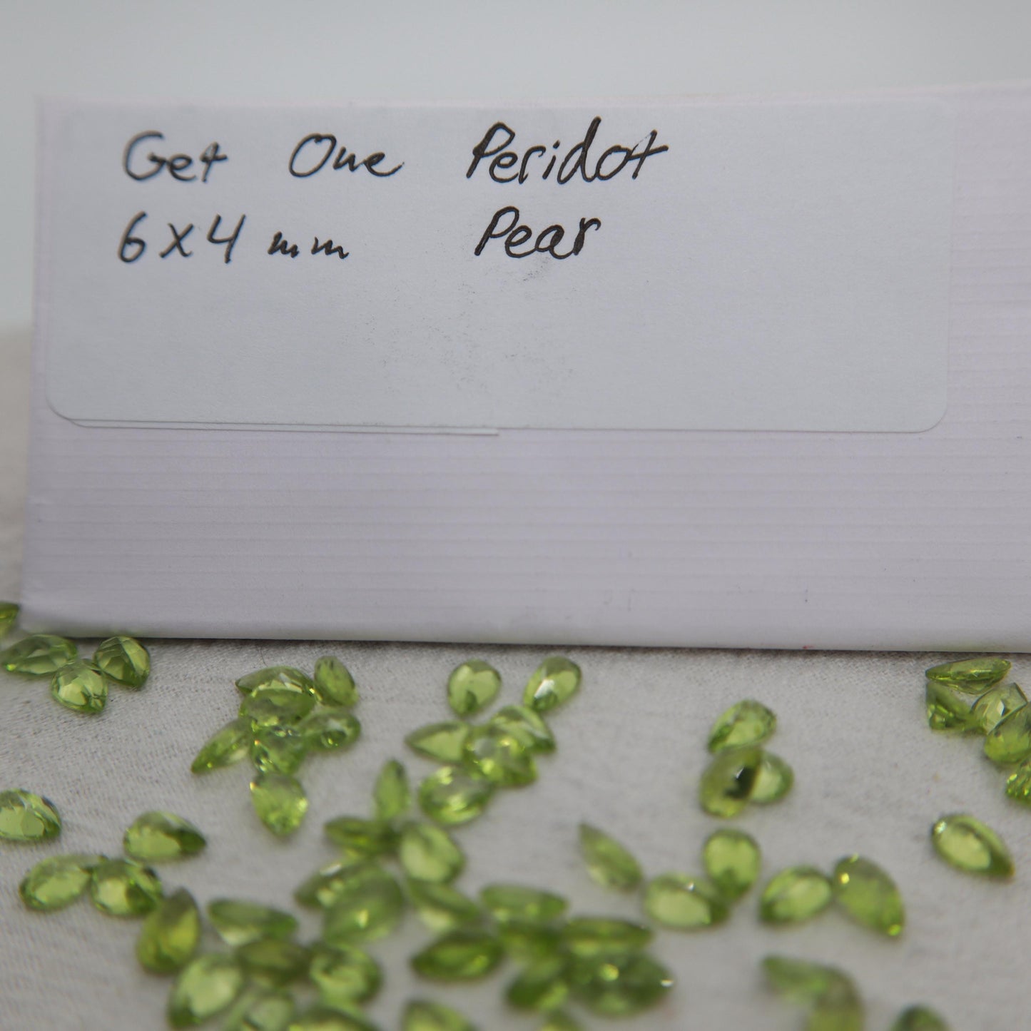 One 6x4mm Peridot Pear Cut, Faceted Loose Green Peridot
