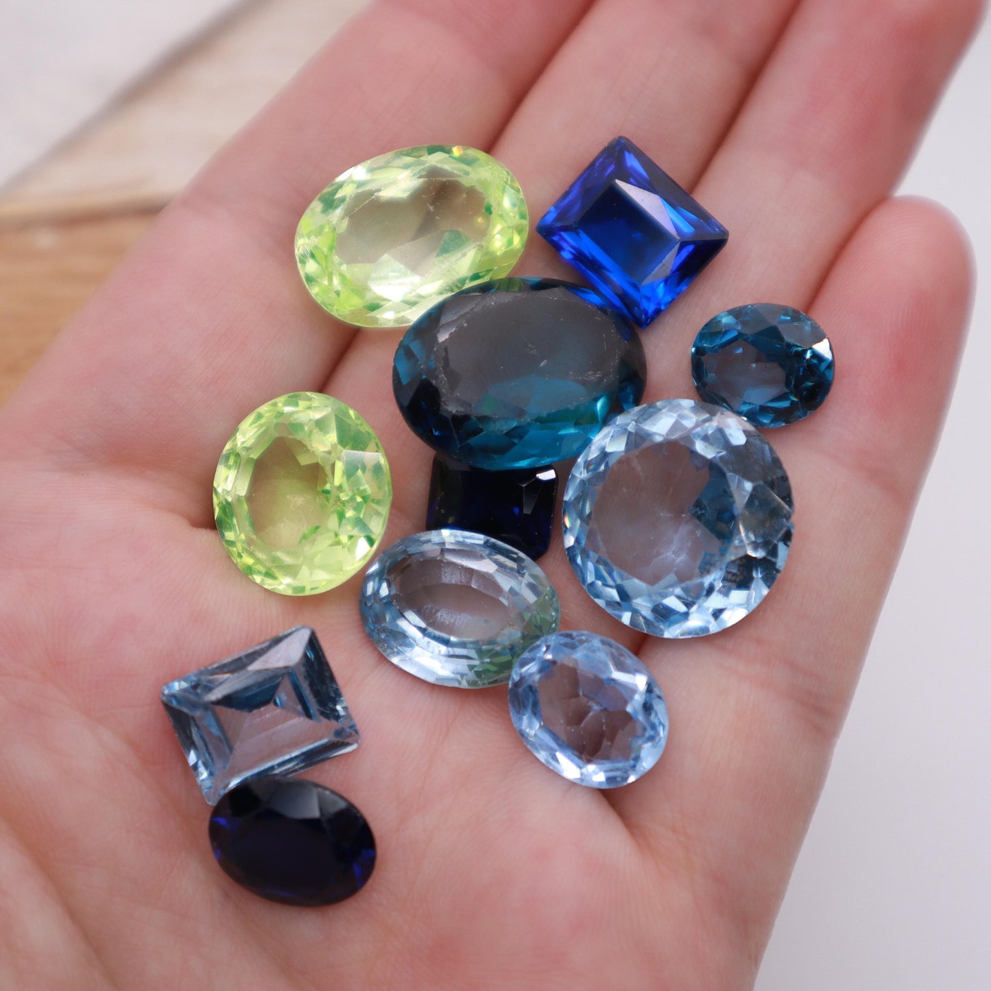 106 carat Lot of Lab Created Spinel 11 stones, Discounted Worn, Faceted, Recycled, Chipped, Damaged Gemstones, Blue and Yellow-Green