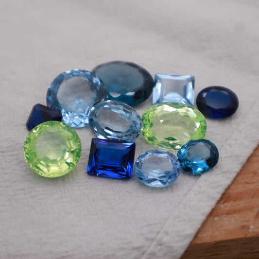 106 carat Lot of Lab Created Spinel 11 stones, Discounted Worn, Faceted, Recycled, Chipped, Damaged Gemstones, Blue and Yellow-Green