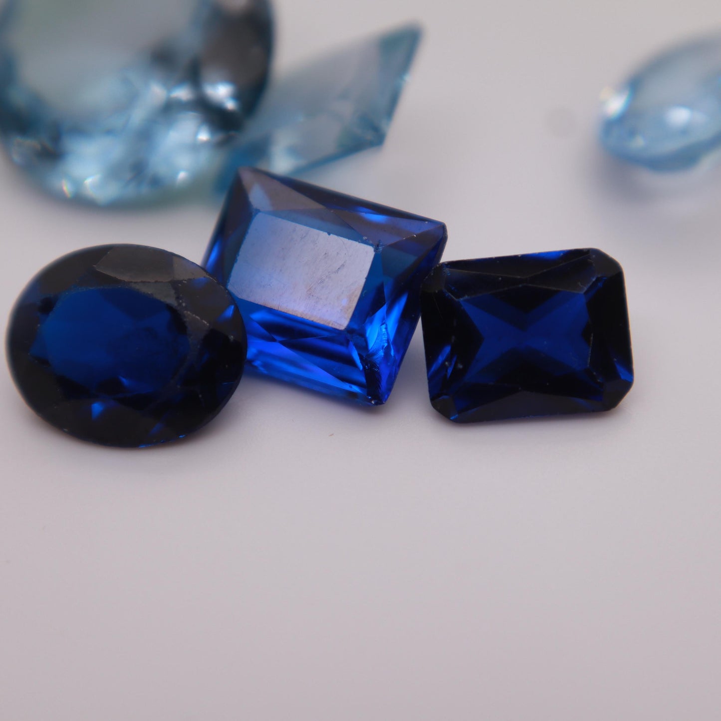 106 carat Lot of Lab Created Spinel 11 stones, Discounted Worn, Faceted, Recycled, Chipped, Damaged Gemstones, Blue and Yellow-Green