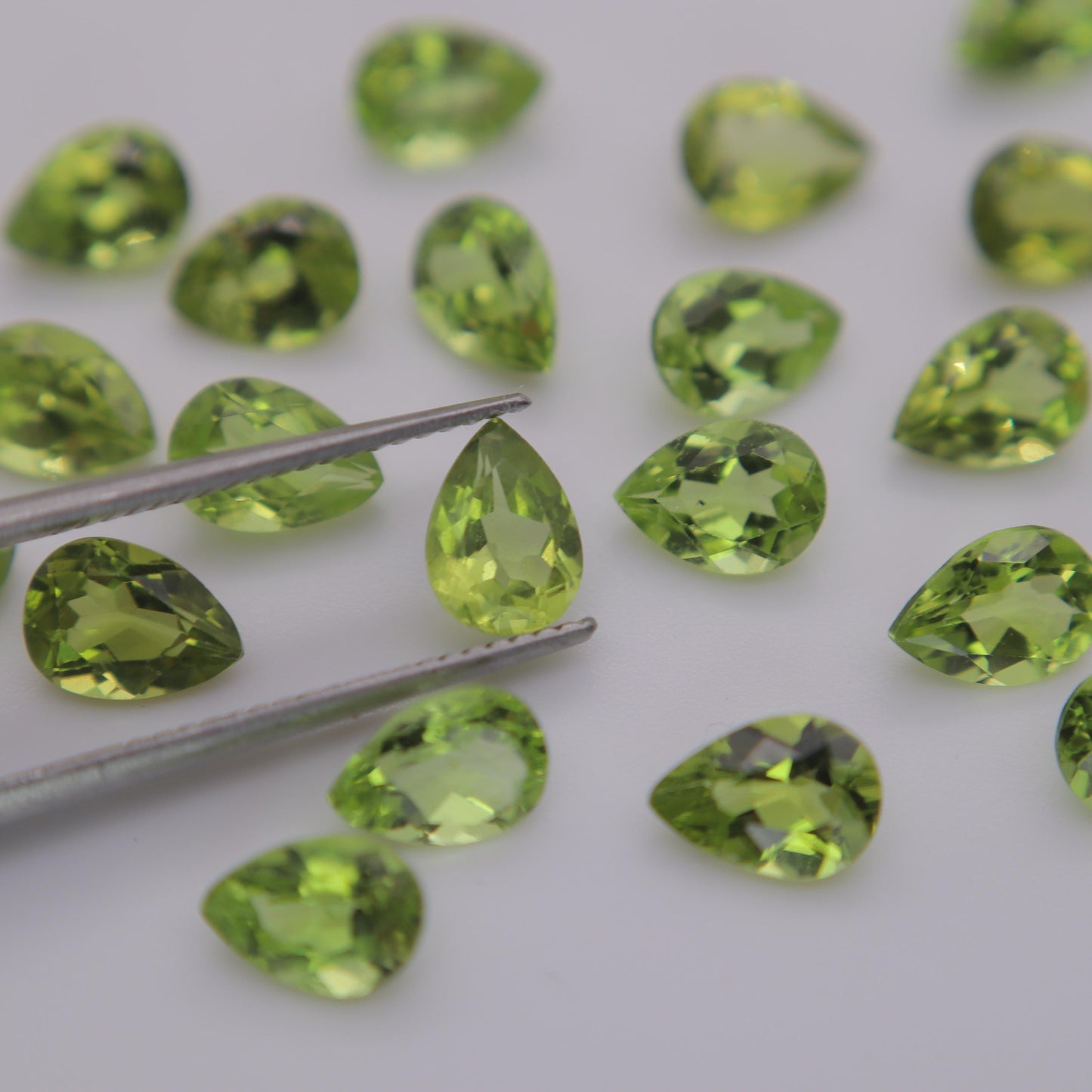 One 7x5mm Peridot Pear Cut, Faceted Loose Green Peridot