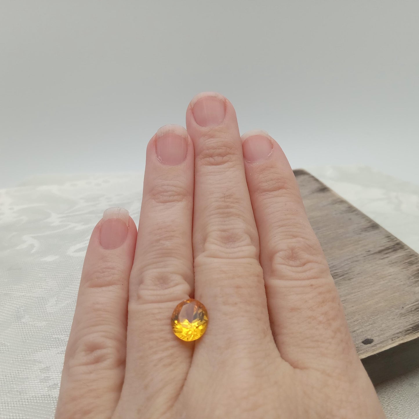 10.1x8.1mm Orangey Yellow Lab Sapphire 3.22 Carat Oval Cut, Faceted Loose Synthetic Corundum