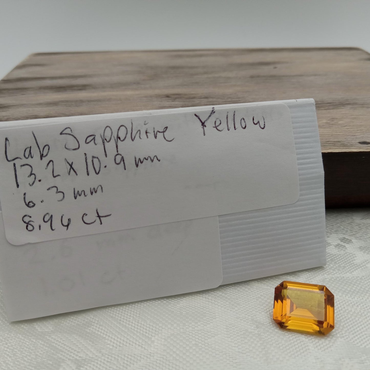 Orangey Yellow Lab Sapphire 8.96 Carat Rectangle Cut, Faceted Loose Synthetic Corundum 13.2x10.9mm
