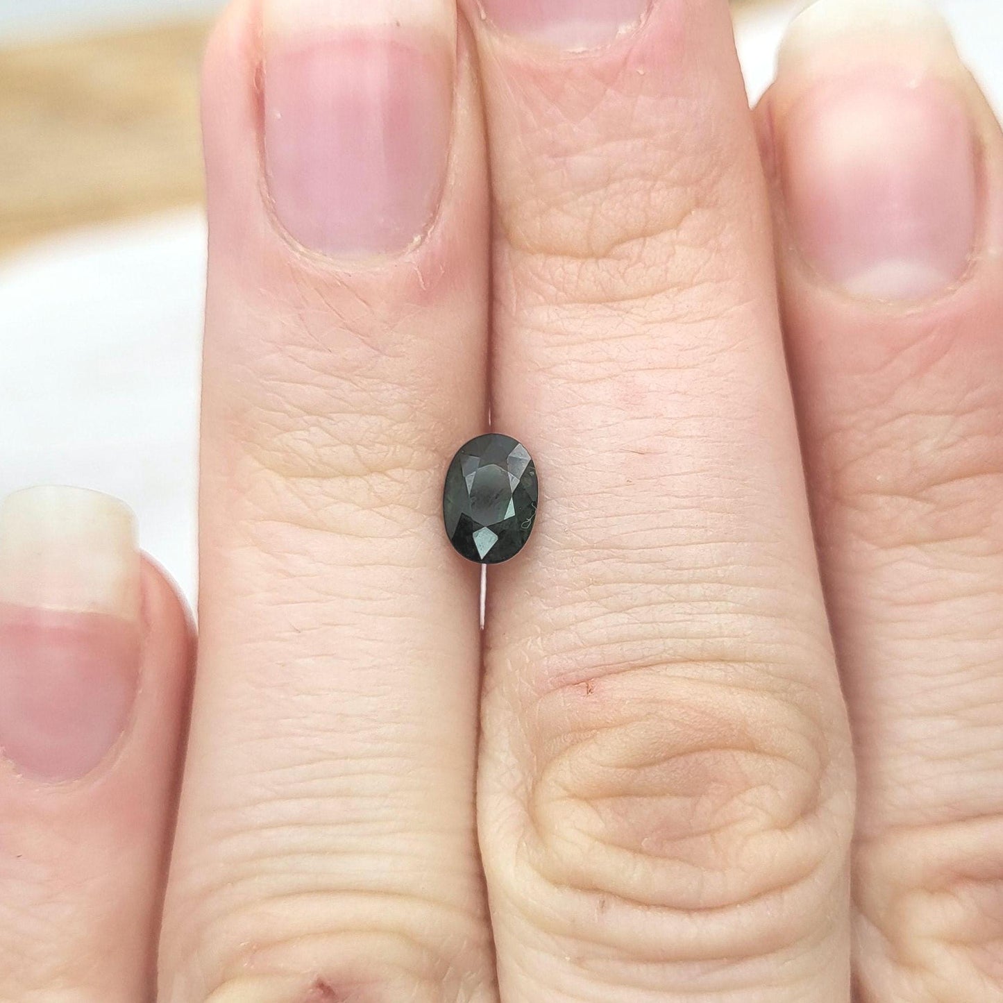 0.72 Carat Dark Green Sapphire 6.3x4.5mm Oval Cut, Faceted Loose Natural Heated Sapphire