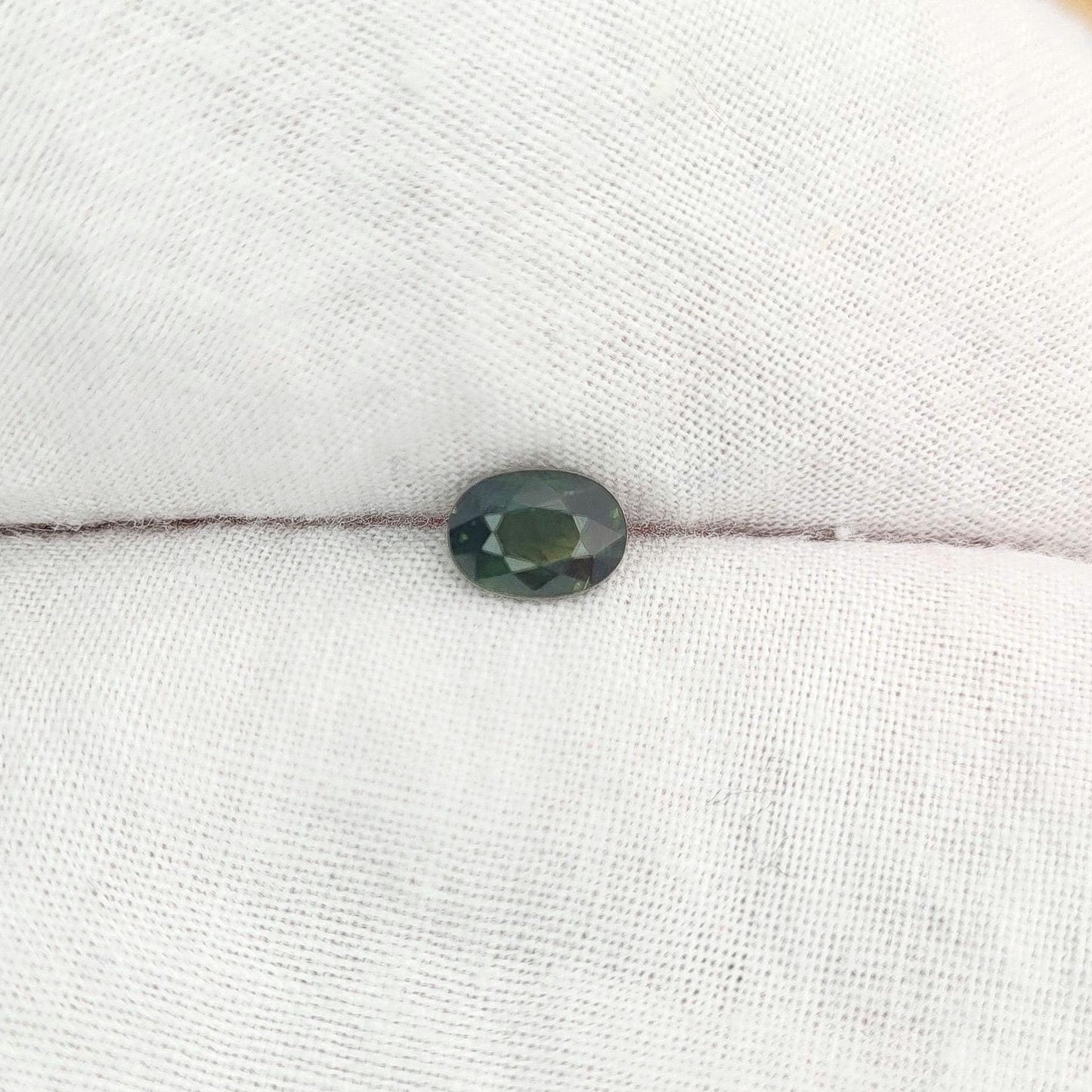 0.72 Carat Dark Green Sapphire 6.3x4.5mm Oval Cut, Faceted Loose Natural Heated Sapphire