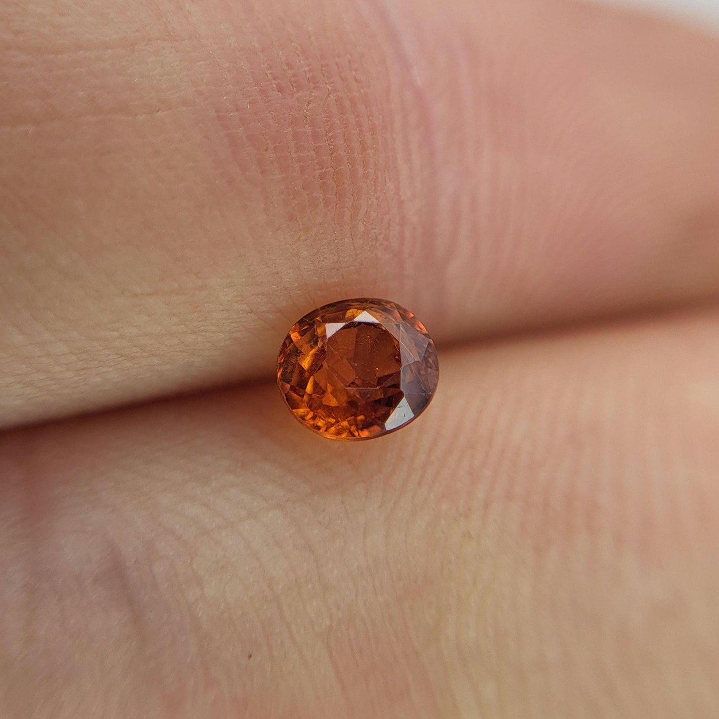 0.62 carat 5x4.3mm Natural Mandarin Spessartite Garnet, Faceted Oval Gemstone, Orange Garnet