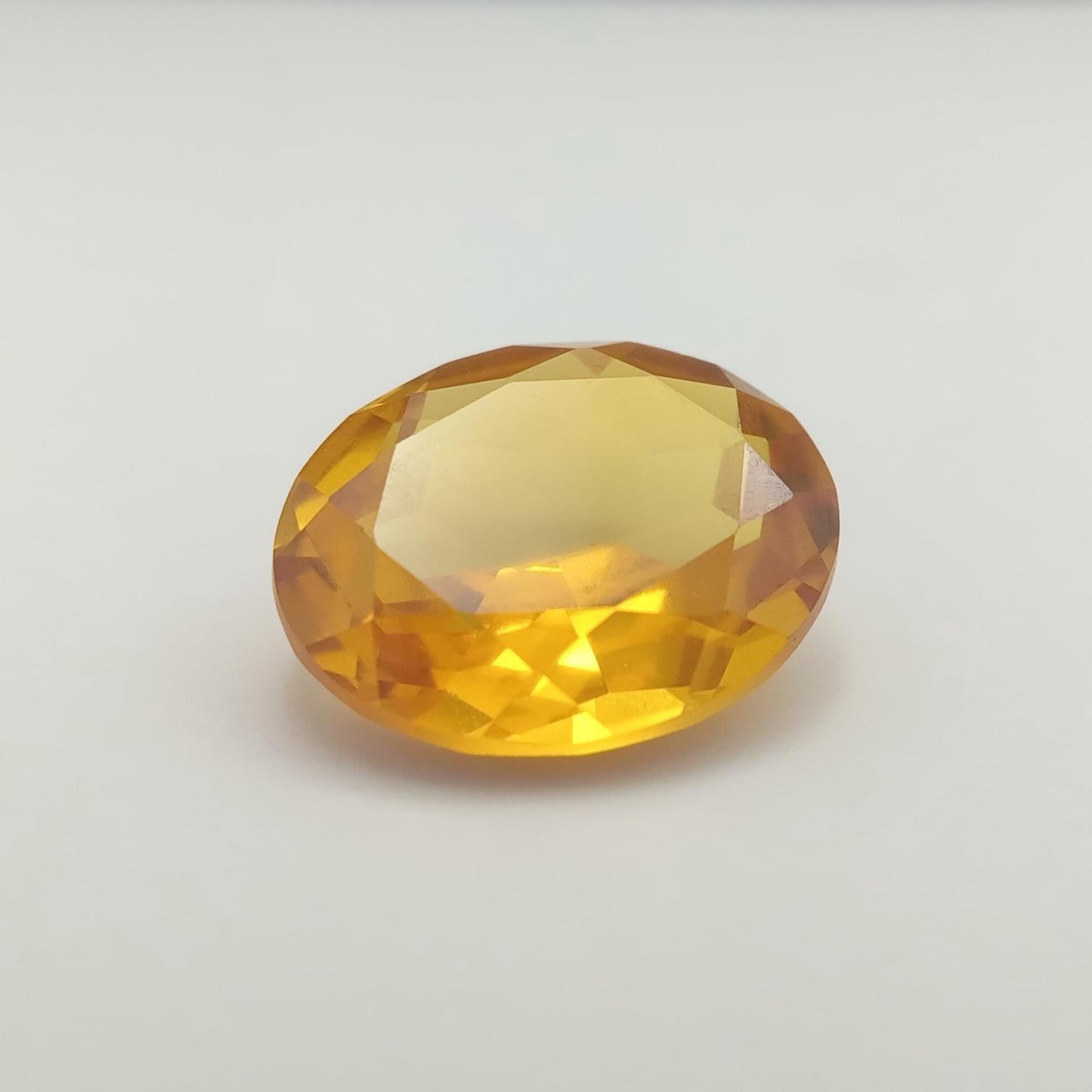 12x10mm Orangey Yellow Lab Sapphire 5.38 Carat Oval Cut, Faceted Loose Synthetic Corundum