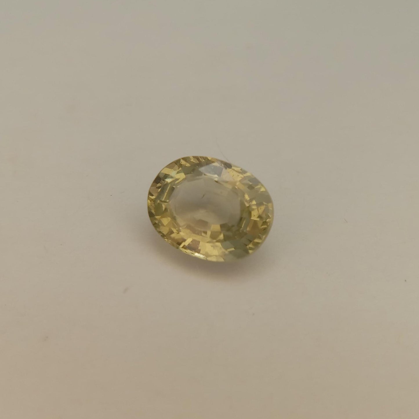 Yellow Green Sapphire 2.14 carat 8.4x6.5mm Oval Cut, Heated