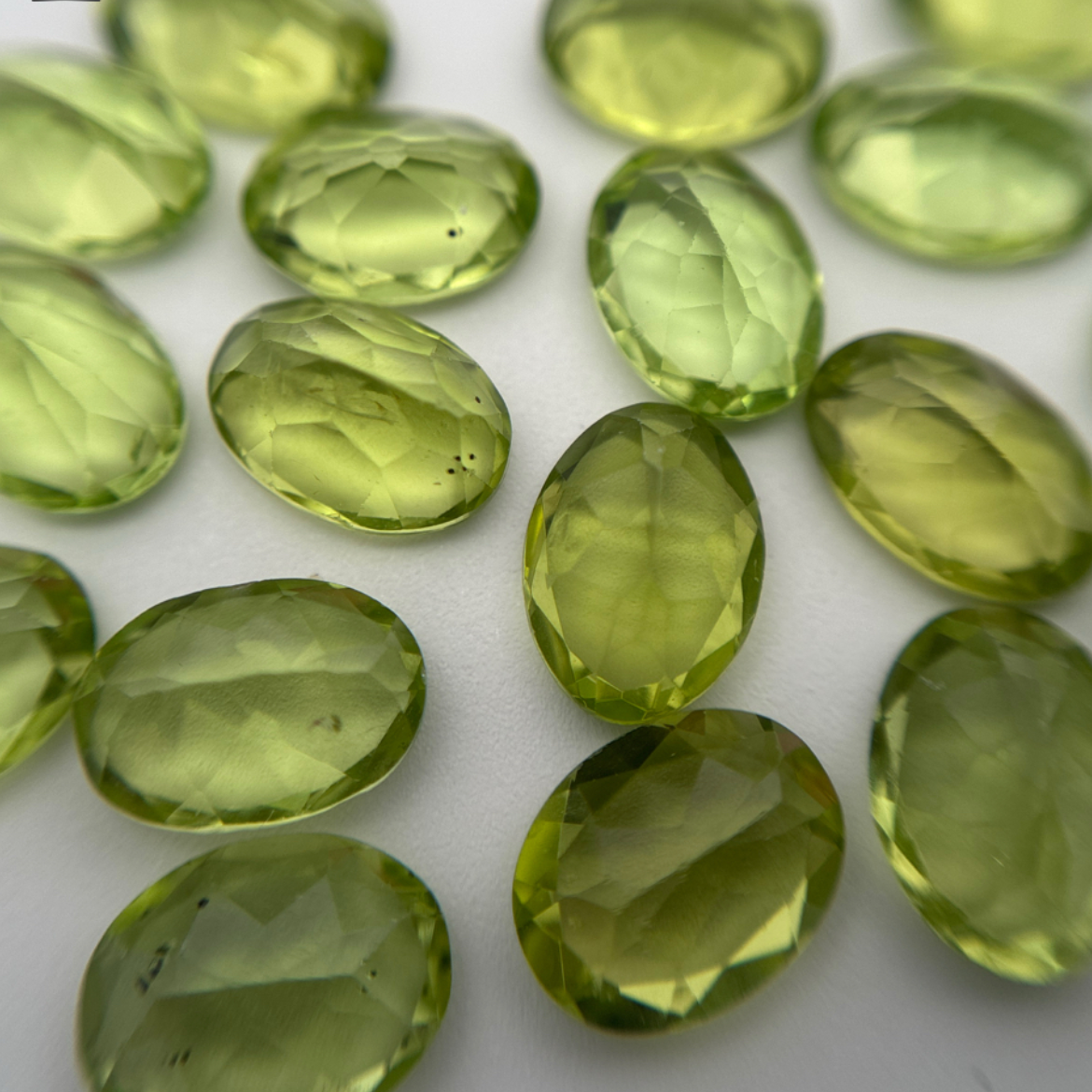 One 7x5mm Green Peridot Oval Cut, Faceted Loose Gemstone
