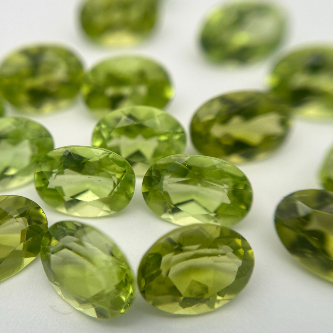 One 7x5mm Green Peridot Oval Cut, Faceted Loose Gemstone