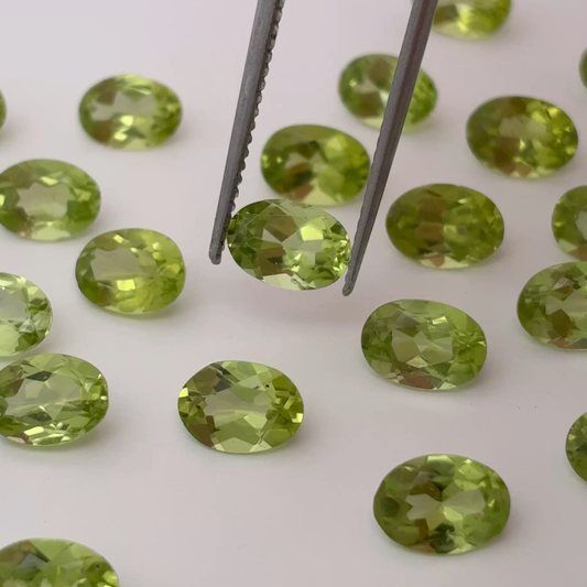 One 7x5mm Green Peridot Oval Cut, Faceted Loose Gemstone