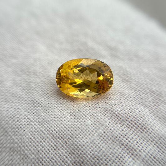 1.7 carat Imperial Topaz 8.4x5.8mm Oval Cut, Golden Yellow Topaz