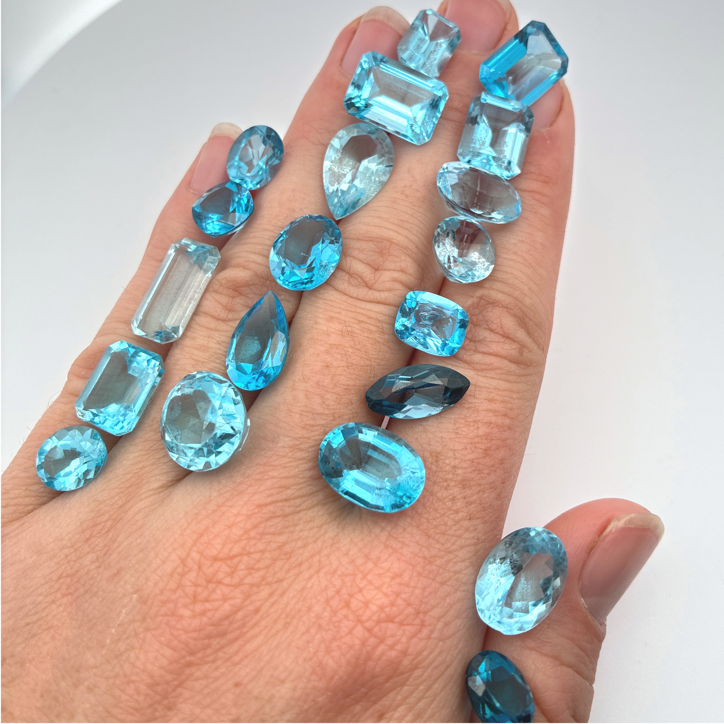 128 carat Lot of Damaged Blue Topaz-21 Piece Pre-formed Topaz Facet Rough