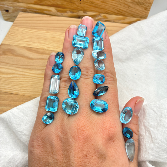 128 carat Lot of Damaged Blue Topaz-21 Piece Pre-formed Topaz Facet Rough