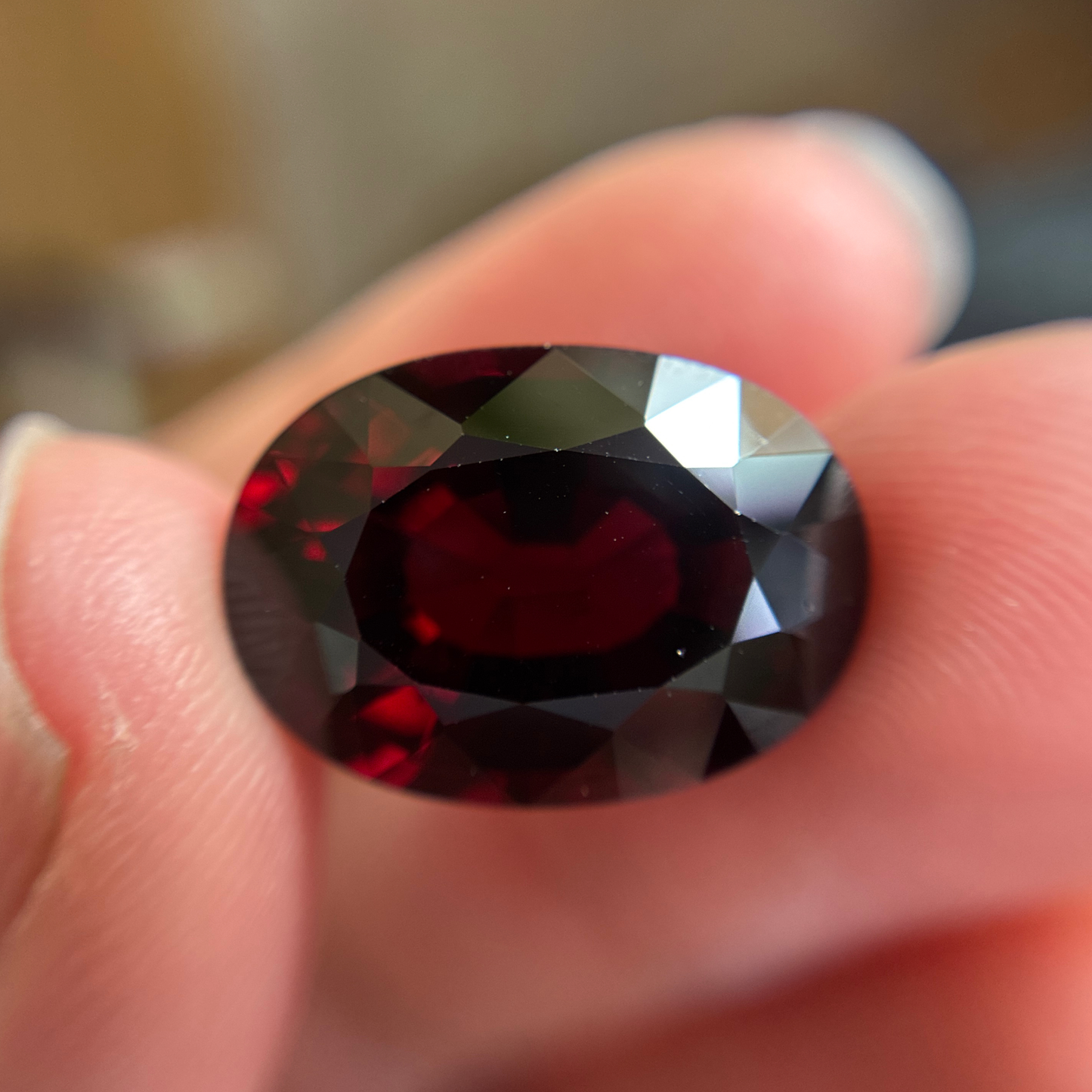 18.88 carat Red Garnet, 18.4x13.4mm Oval cut