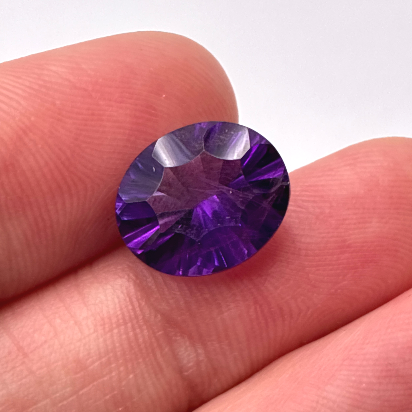 12x10mm Concave Oval Cut Amethyst, 3.94 carat