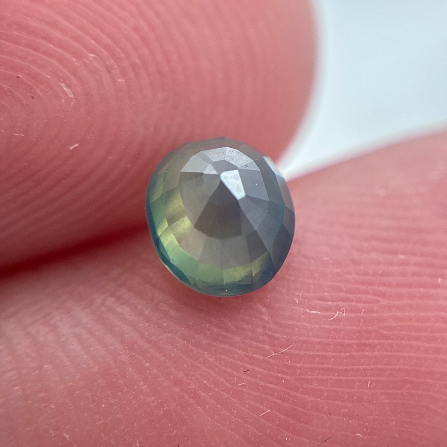 Natural Bluish Green Mermaid Sapphire 0.77 carat 5.5x4.8mm Oval Cut, Heated