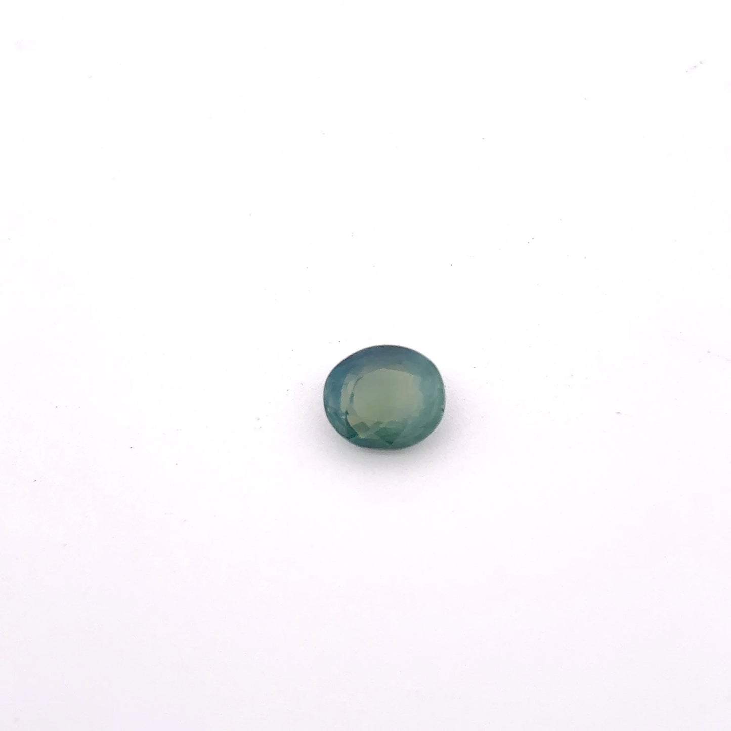 Natural Bluish Green Mermaid Sapphire 0.77 carat 5.5x4.8mm Oval Cut, Heated