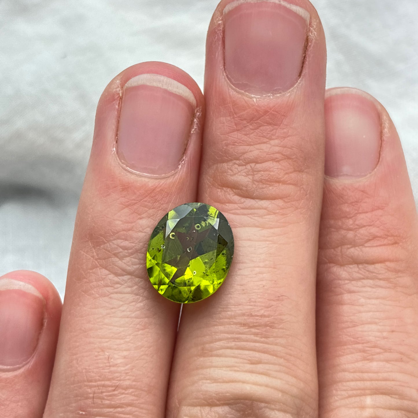 4 carat Peridot 12x10mm Oval Cut, Olive Green Faceted Loose Gemstone