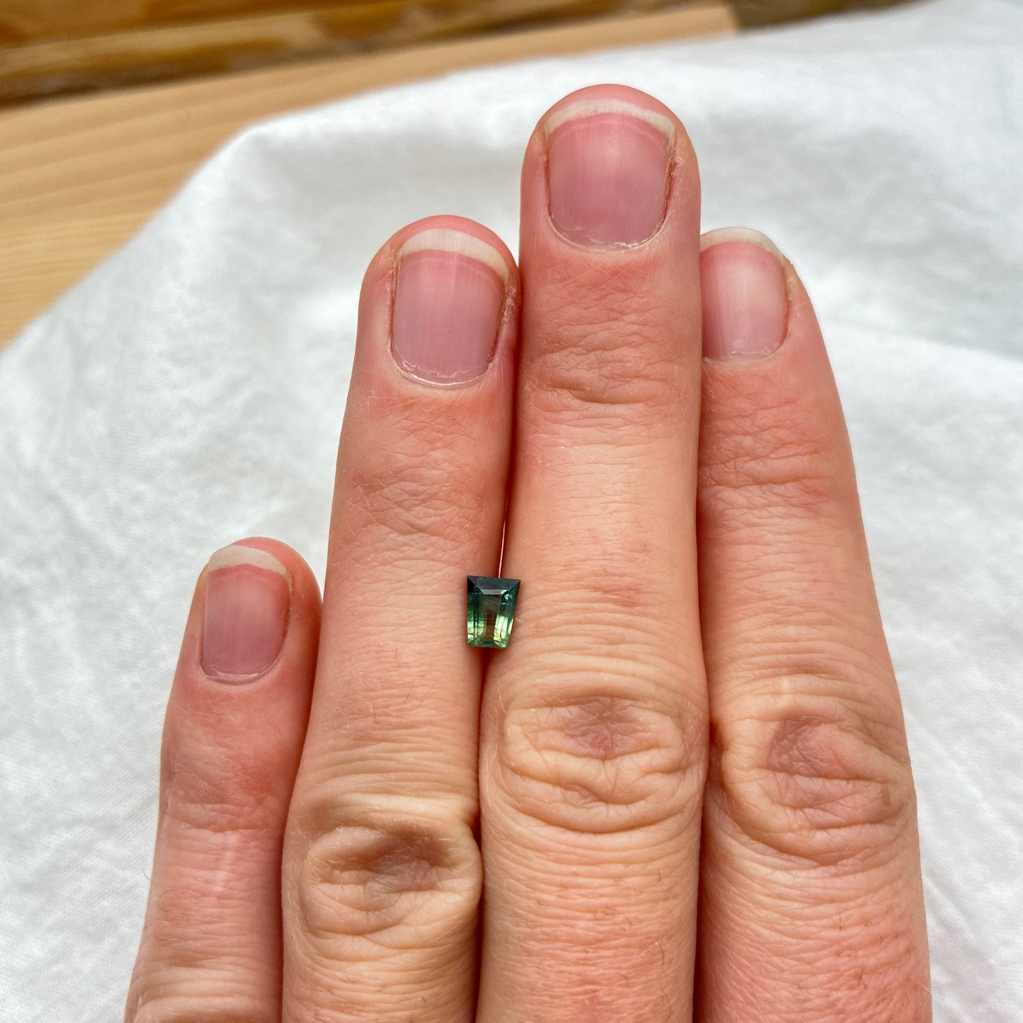 0.68ct Natural Green Heated Parti Sapphire Tapered Baguette