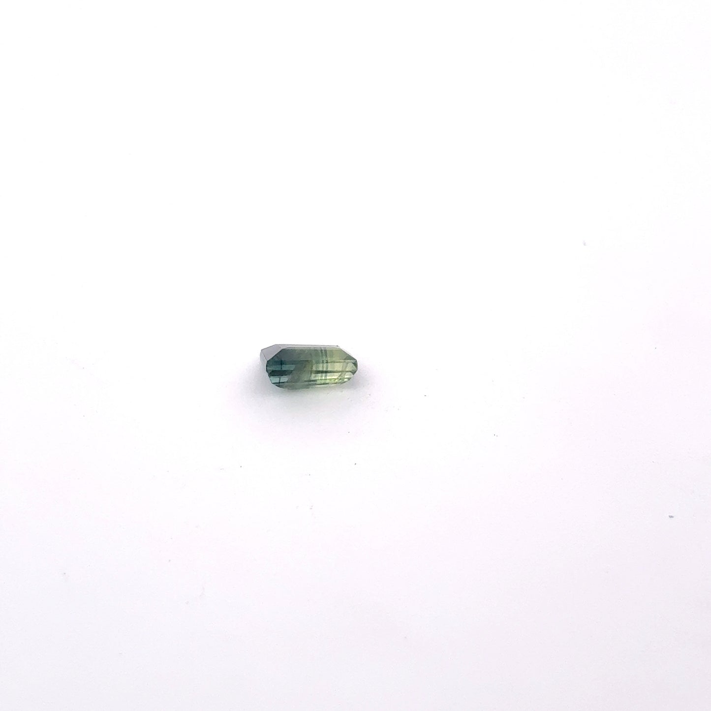 0.68ct Natural Green Heated Parti Sapphire Tapered Baguette