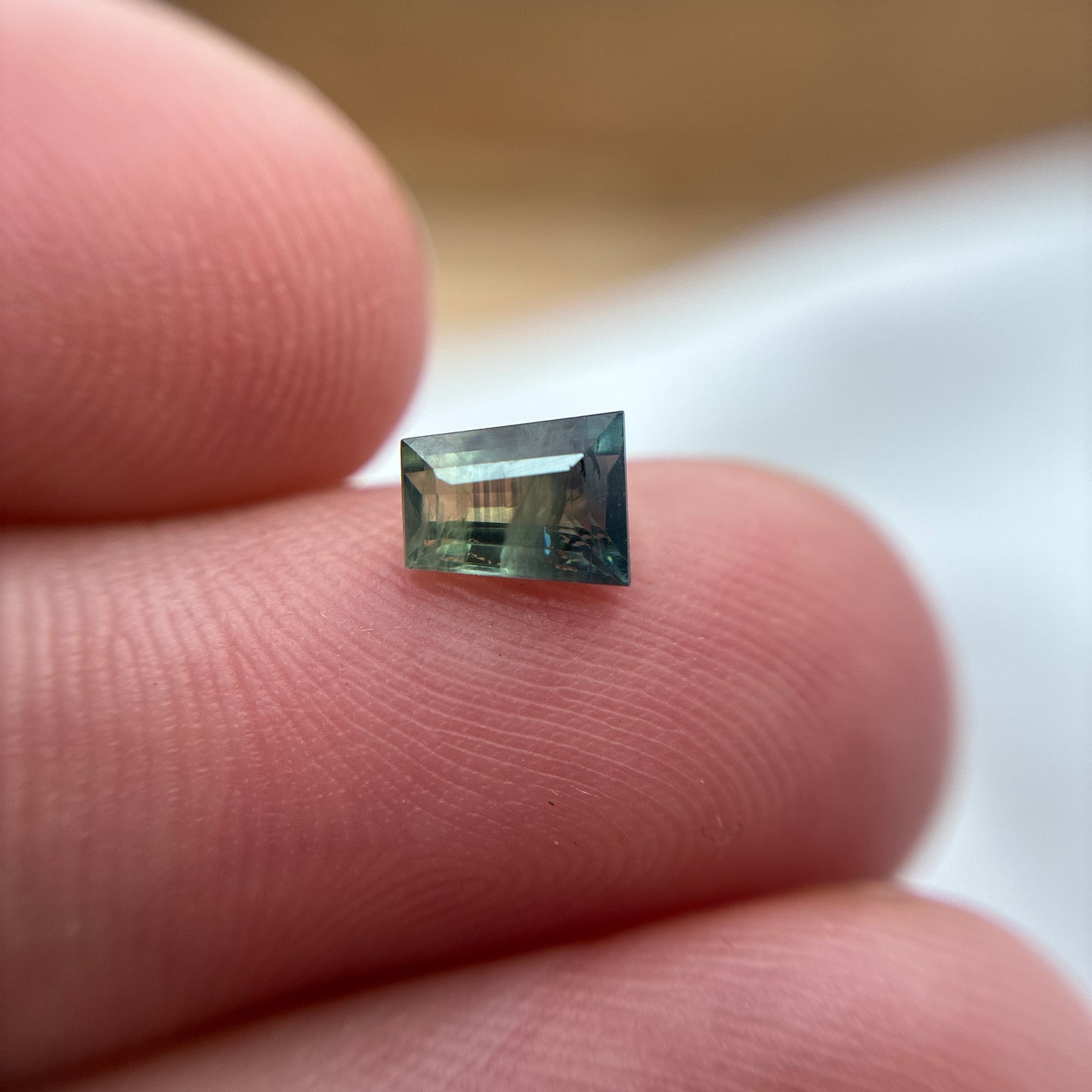 0.68ct Natural Green Heated Parti Sapphire Tapered Baguette