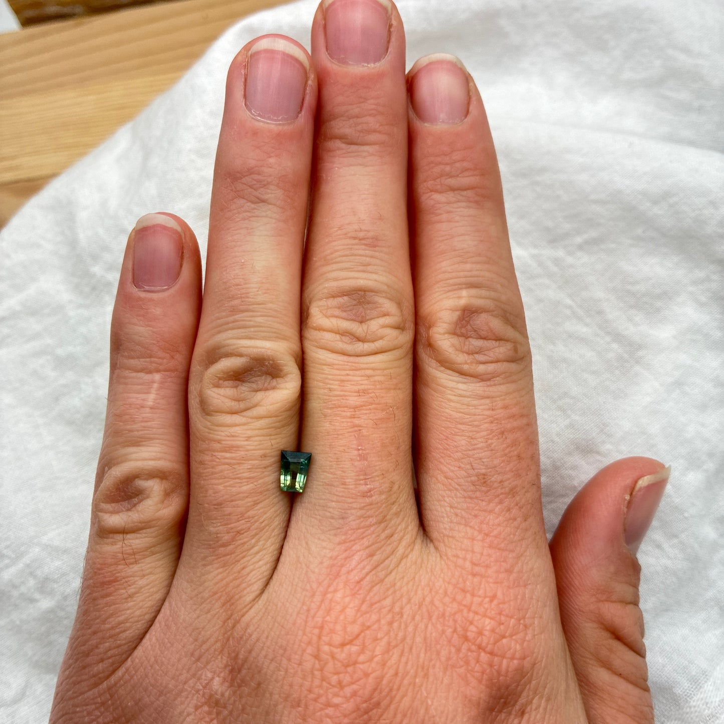 0.68ct Natural Green Heated Parti Sapphire Tapered Baguette