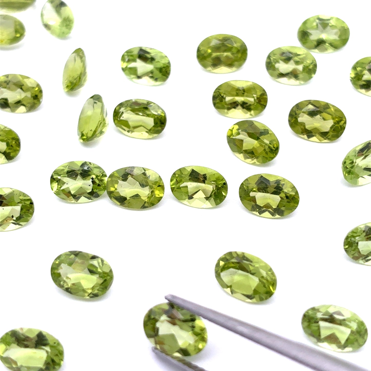 One 7x5mm Green Peridot Oval Cut, Faceted Loose Gemstone