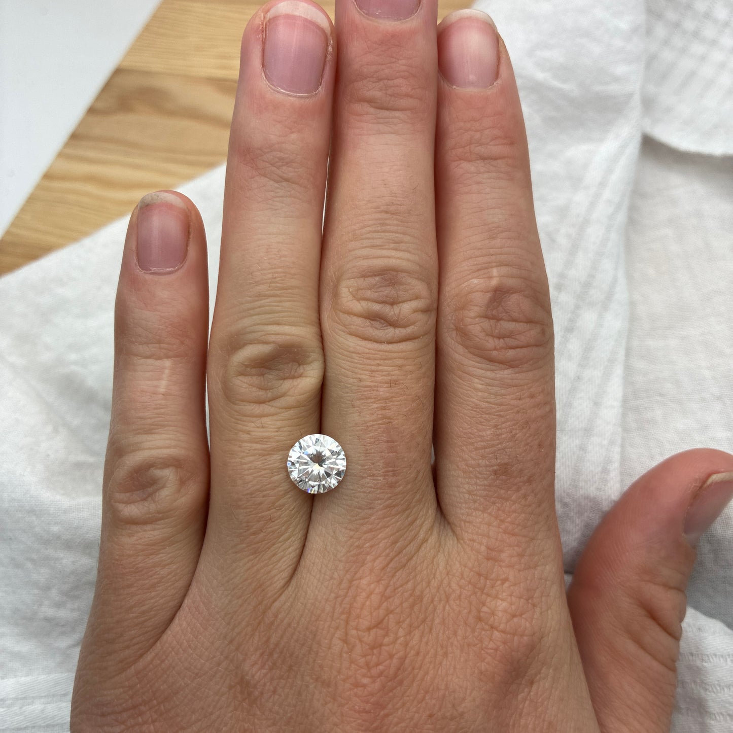 Recycled Preowned Forever One Moissanite 8mm round Laser Inscribed 1.72 carat