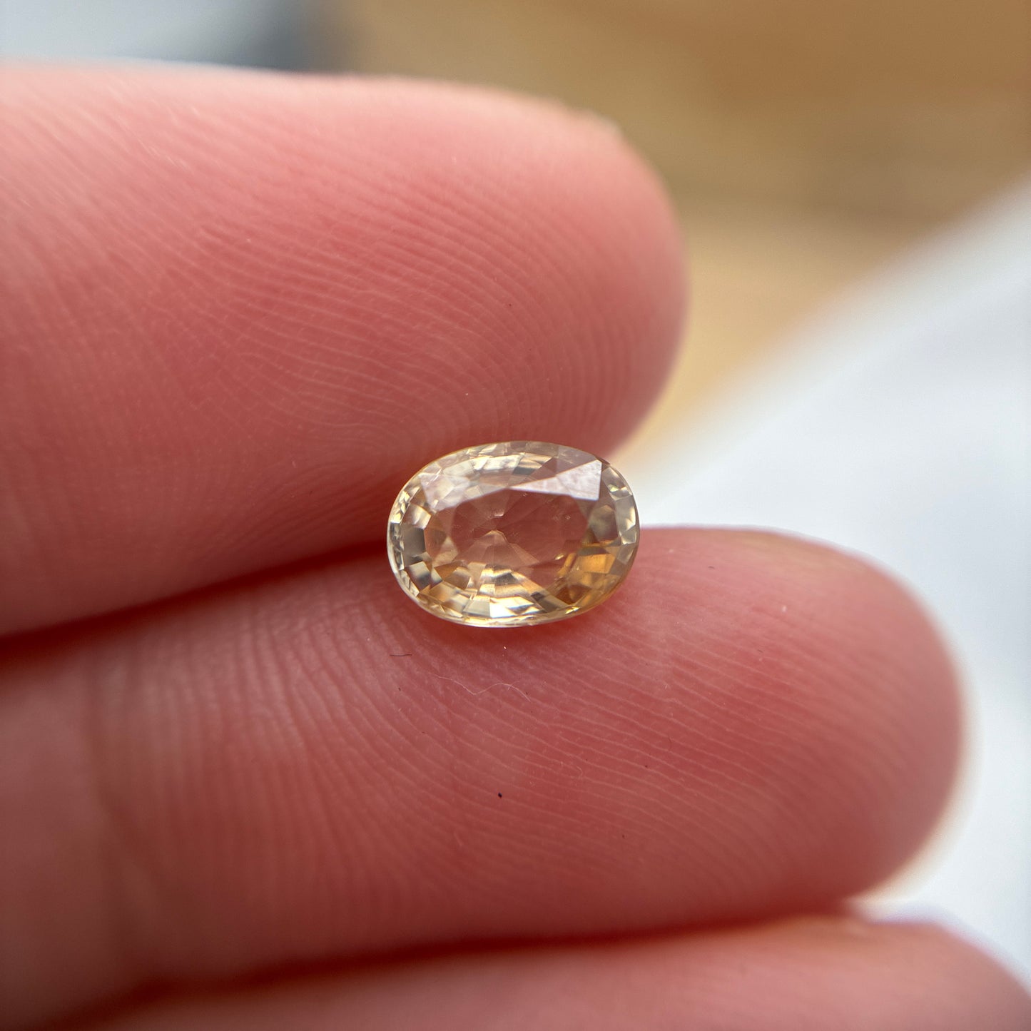 Loose Natural Zircon Orangish yellow-toned Champagne 7x5mm oval 1.50 carat 1 1/2 ct gemstone