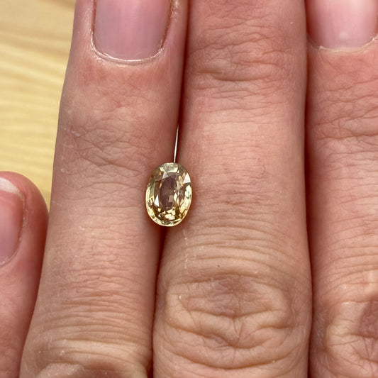 Loose Natural Zircon Orangish yellow-toned Champagne 7x5mm oval 1.50 carat 1 1/2 ct gemstone