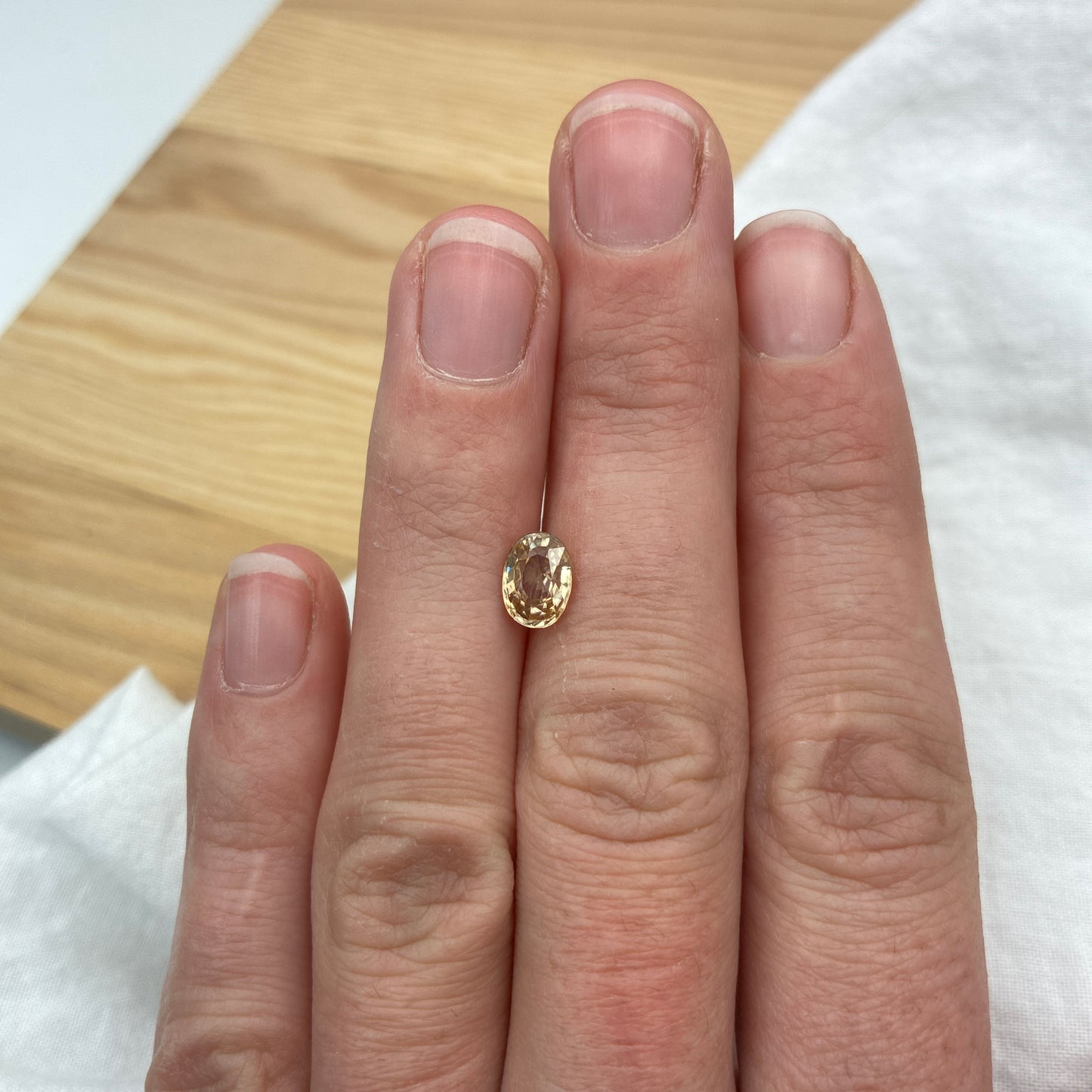 Loose Natural Zircon Orangish yellow-toned Champagne 7x5mm oval 1.50 carat 1 1/2 ct gemstone