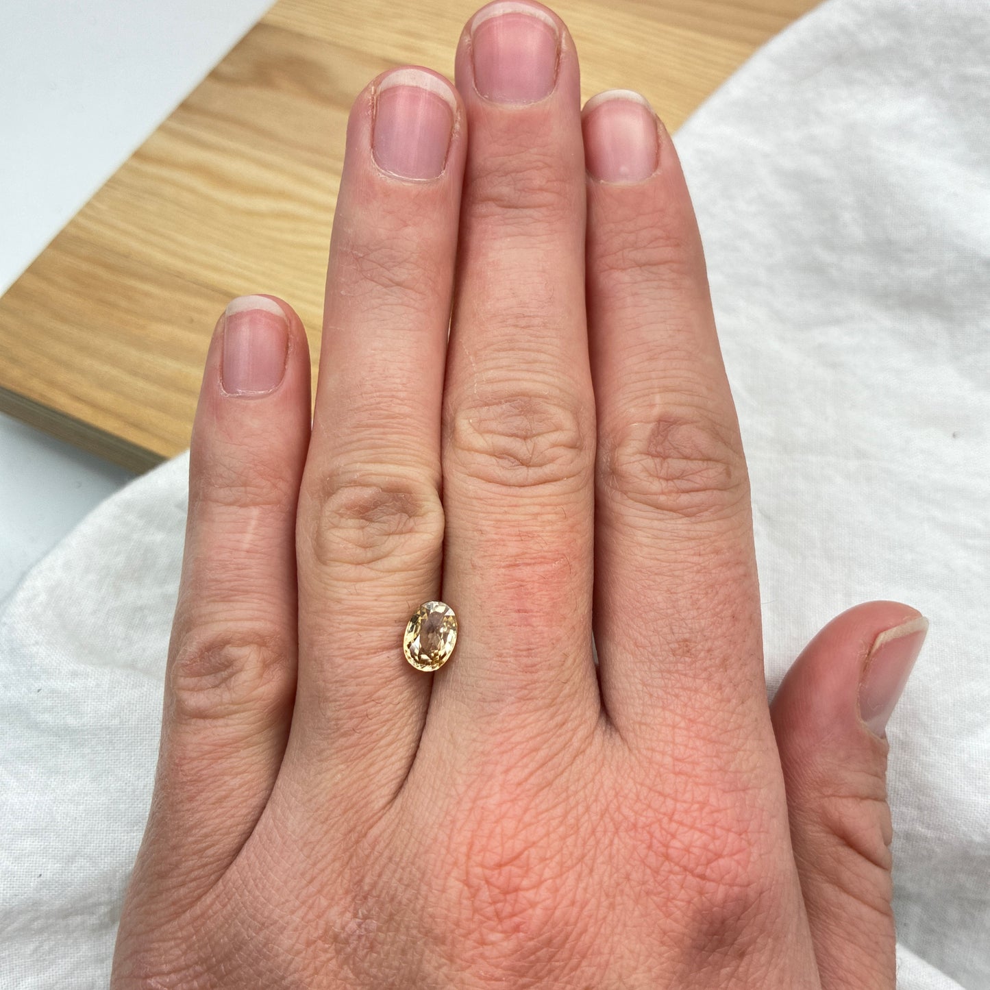 Loose Natural Zircon Orangish yellow-toned Champagne 7x5mm oval 1.50 carat 1 1/2 ct gemstone