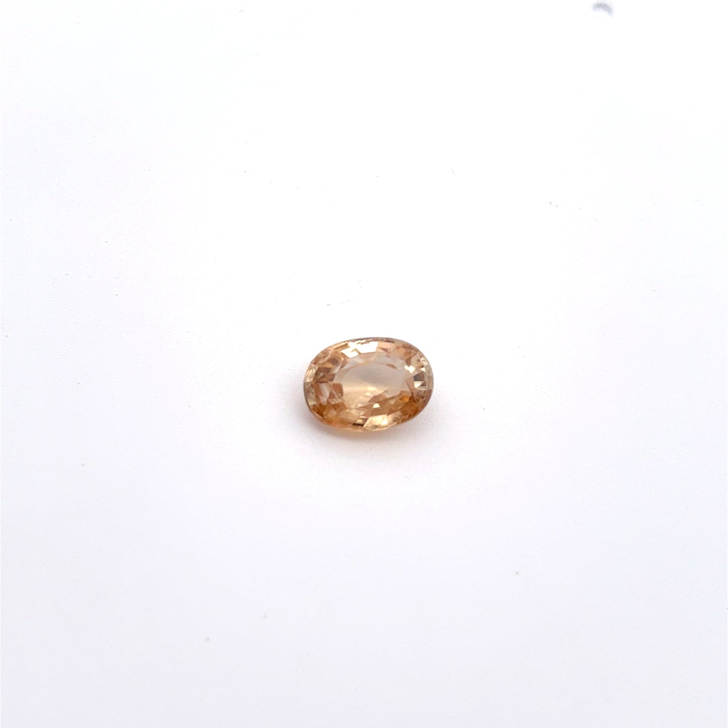 Loose Natural Zircon Orangish yellow-toned Champagne 7x5mm oval 1.50 carat 1 1/2 ct gemstone
