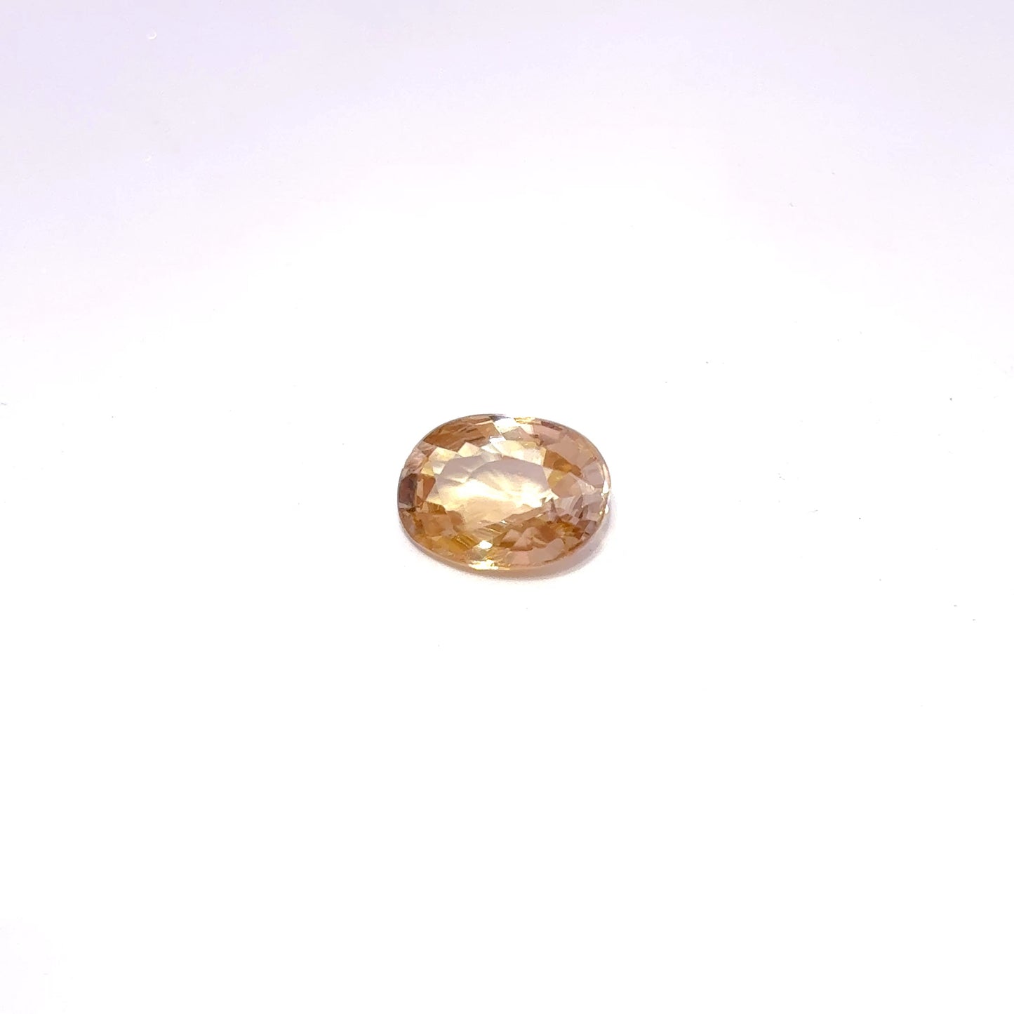 Loose Natural Zircon Orangish yellow-toned Champagne 7x5mm oval 1.50 carat 1 1/2 ct gemstone