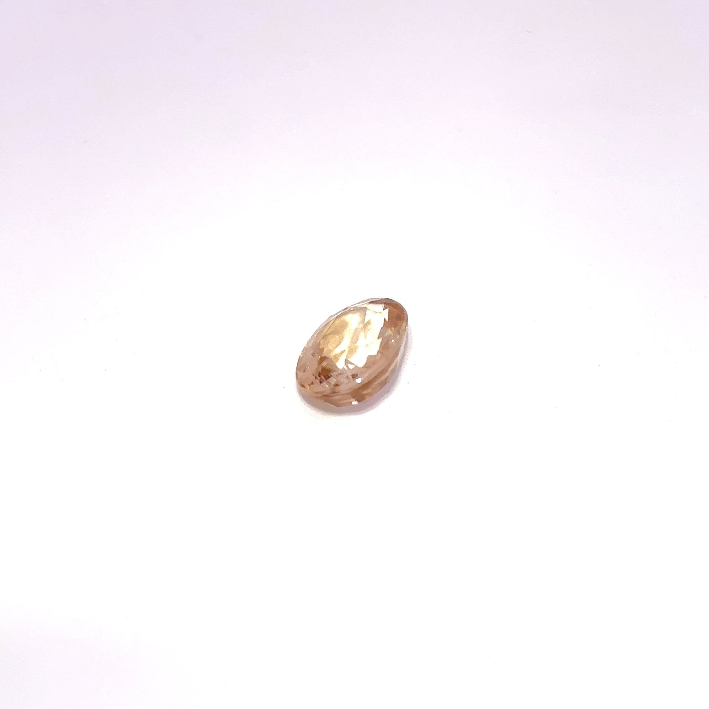 Loose Natural Zircon Orangish yellow-toned Champagne 7x5mm oval 1.50 carat 1 1/2 ct gemstone