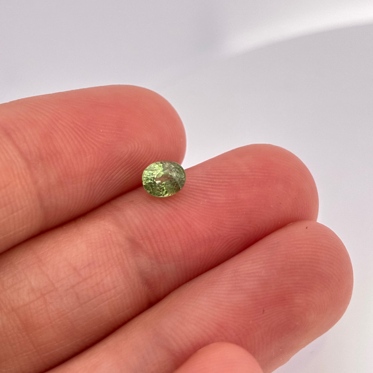 0.57 carat Natural Demantoid Garnet 5x4mm Oval Cut
