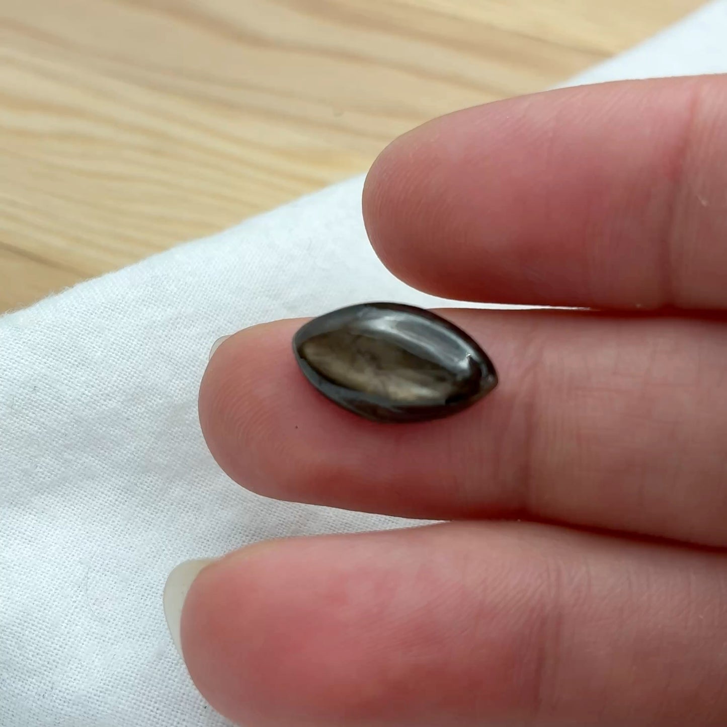 6 carat Black Star Sapphire 15.3x8.6mm Marquise Cabochon