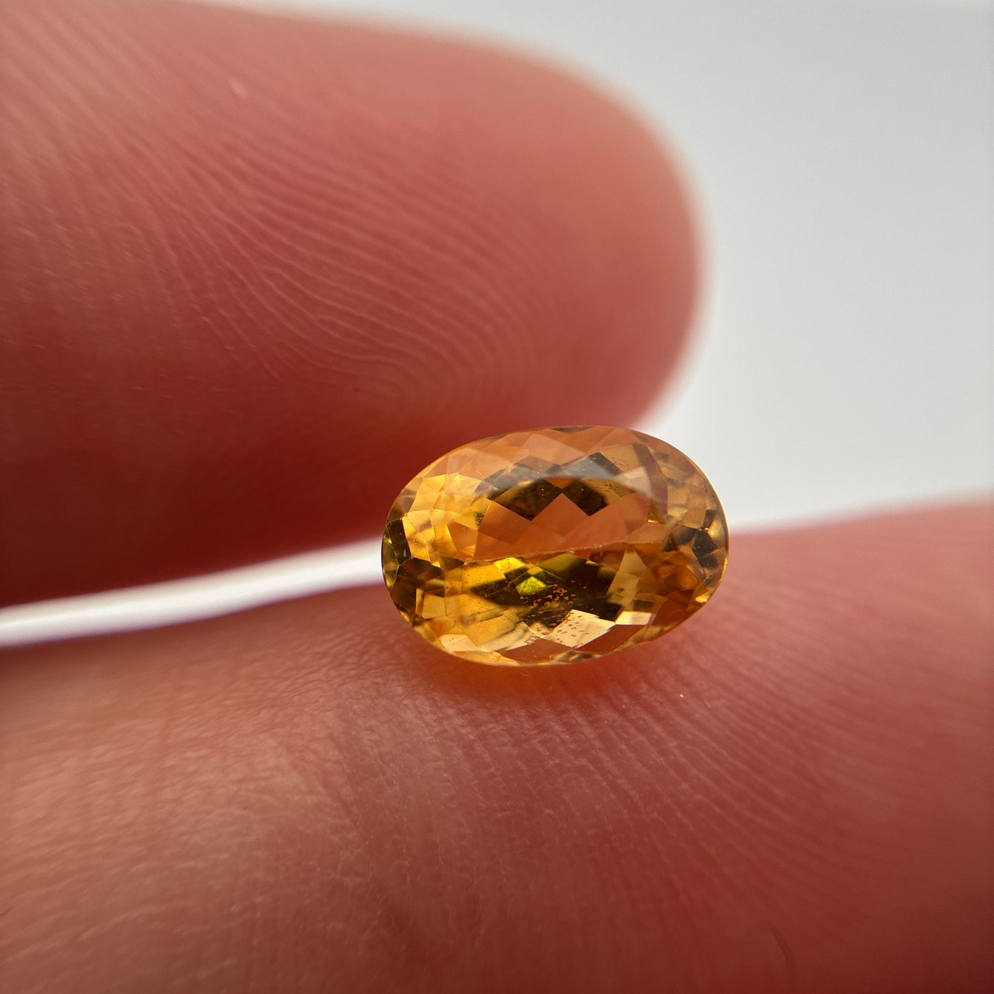 1.7 carat Imperial Topaz 8.4x5.8mm Oval Cut, Golden Yellow Topaz