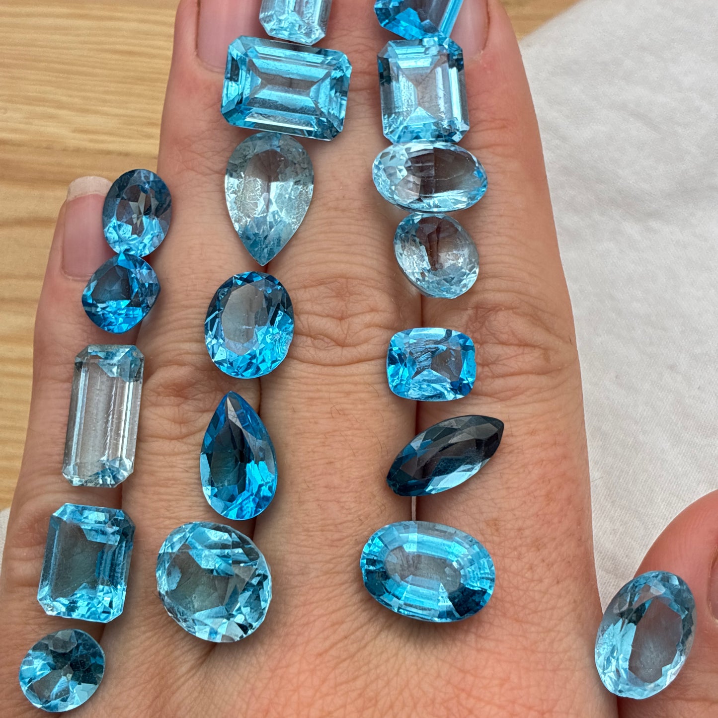 128 carat Lot of Damaged Blue Topaz-21 Piece Pre-formed Topaz Facet Rough